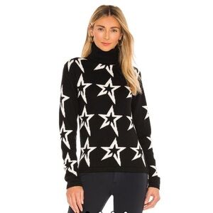 Perfect Moment stardust merino wool turtleneck sweater in black